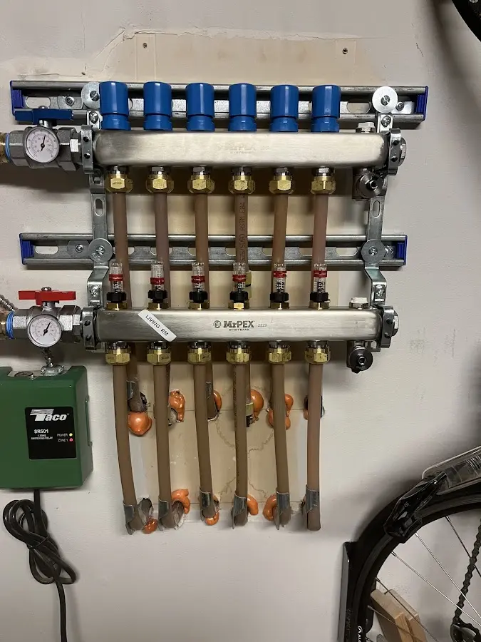 Plumber performing Water Heater Repair at a residential property in Becker